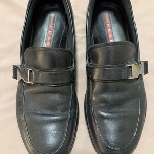 Prada leather loafers with a signature logo buckle, Men’s 9.5US
